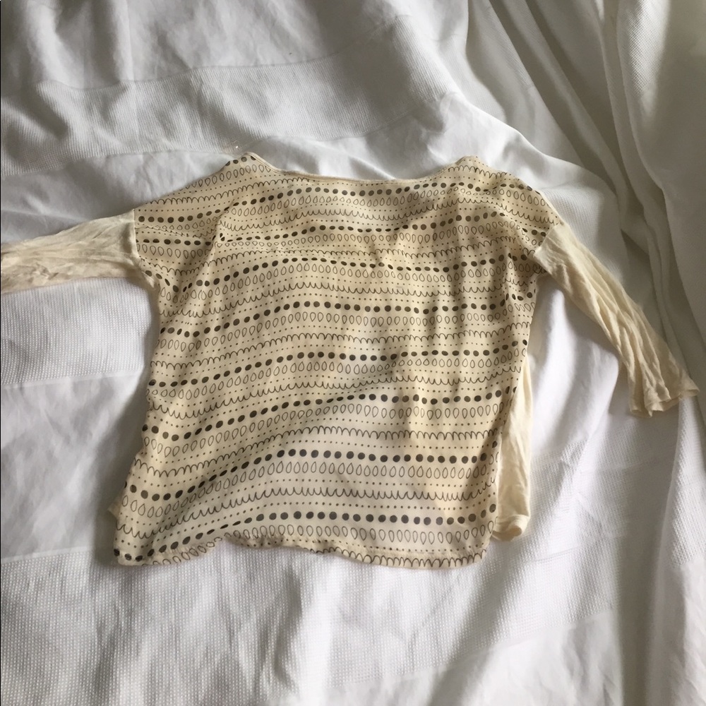 Creme and black top