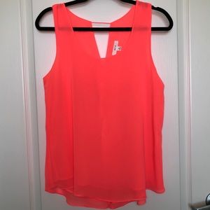 Neon coral blouse with gold spike buttons