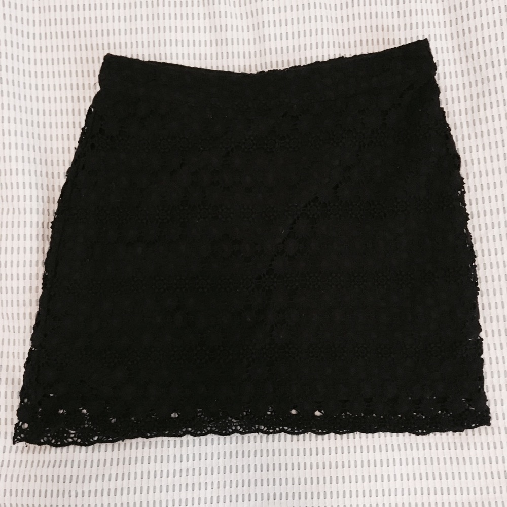 Black mini skirt with lace overlay