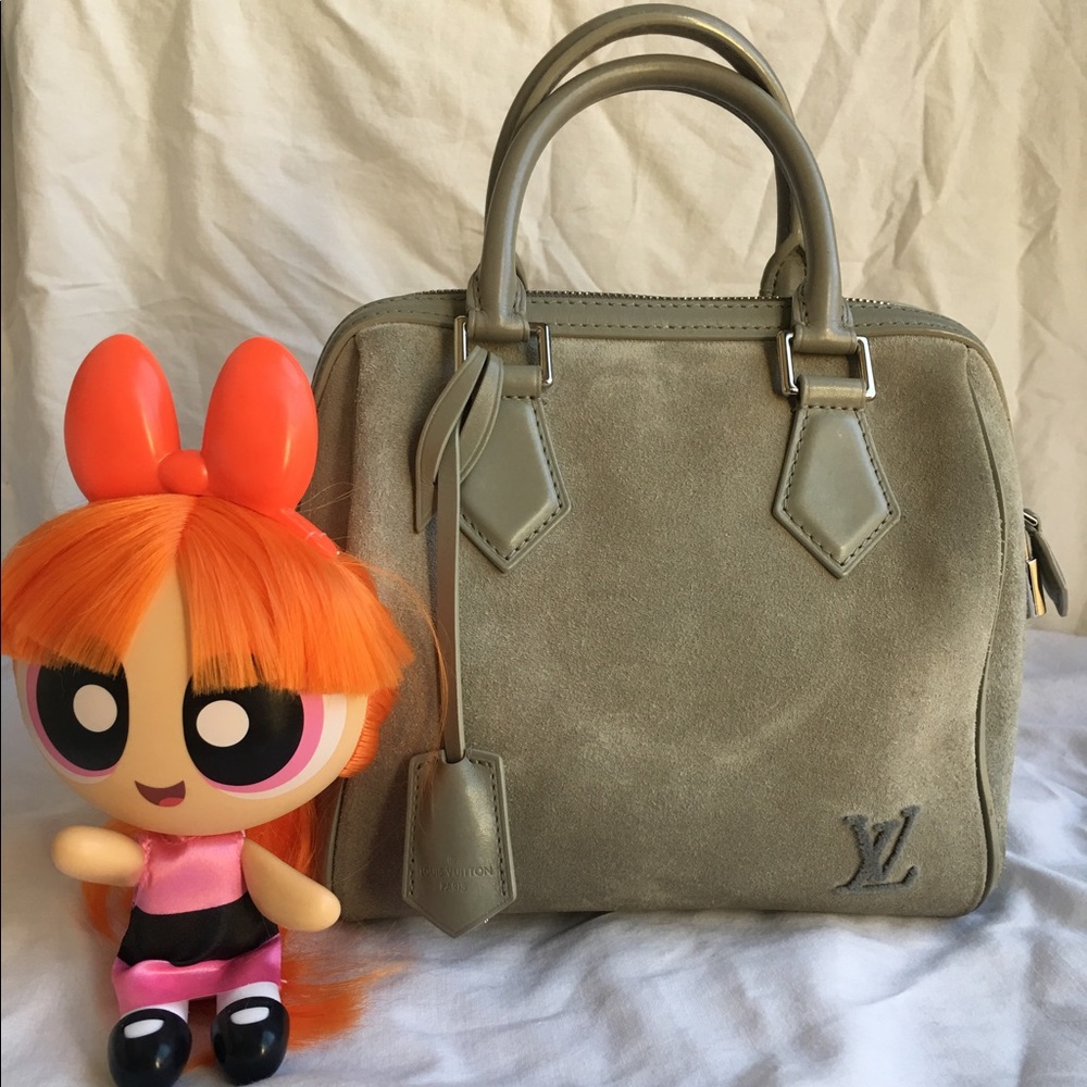 Authentic Louis Vuitton speedy cube suede