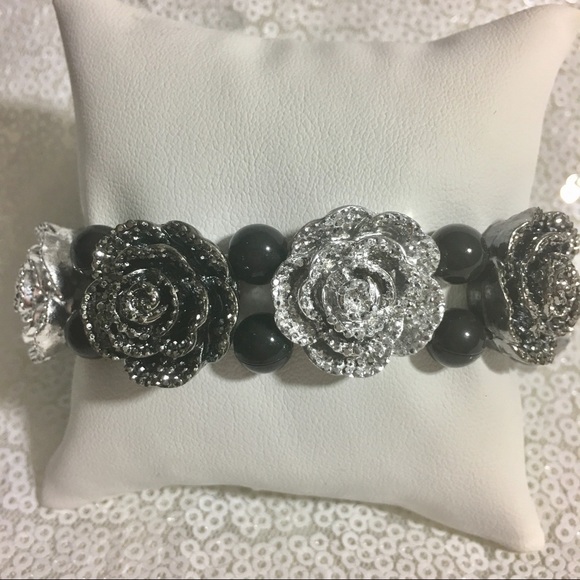 Jewelry - Silver and black colored rosette bracelet