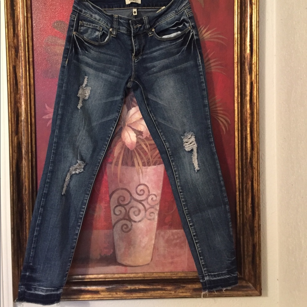 Distressed denim ankle jeans