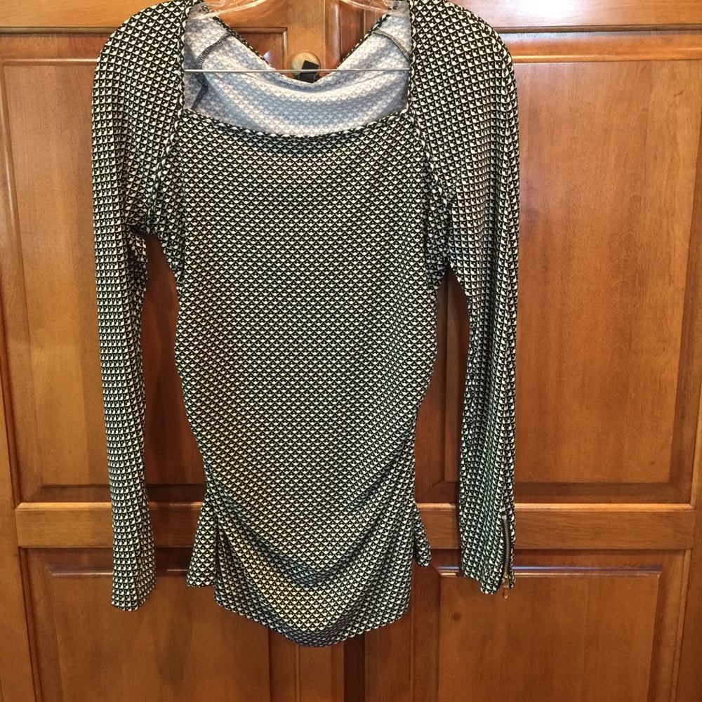 SOLD.  Long sleeve shirt with grouping on sides