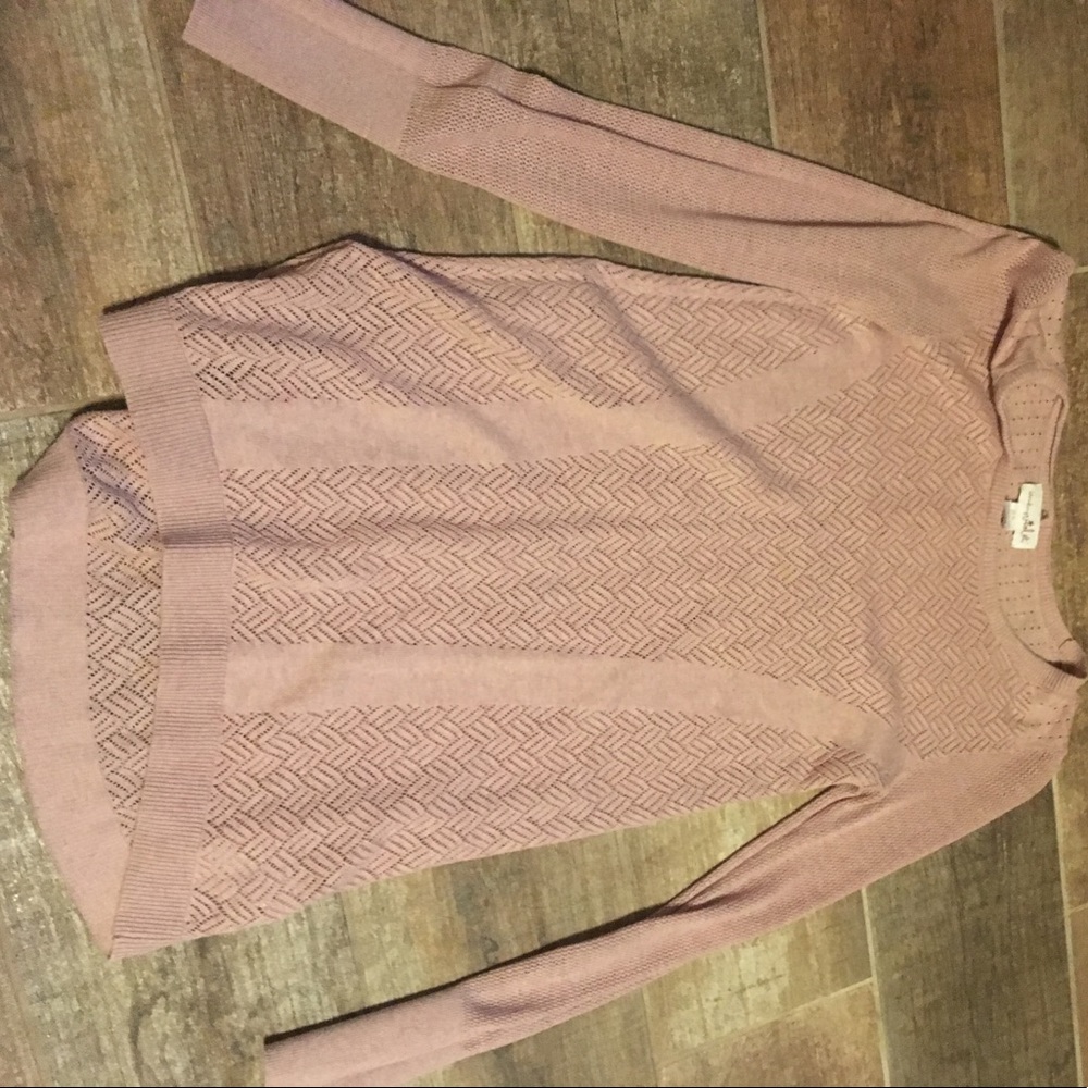 Pink sweater with simple design