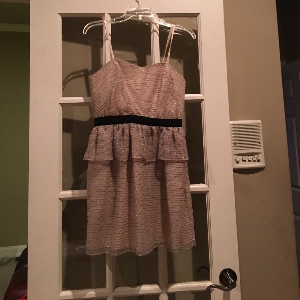 A halter BCBG peplum dress. Only worn once!