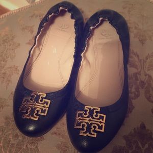 Tory Burch leather black flats with gold emblem