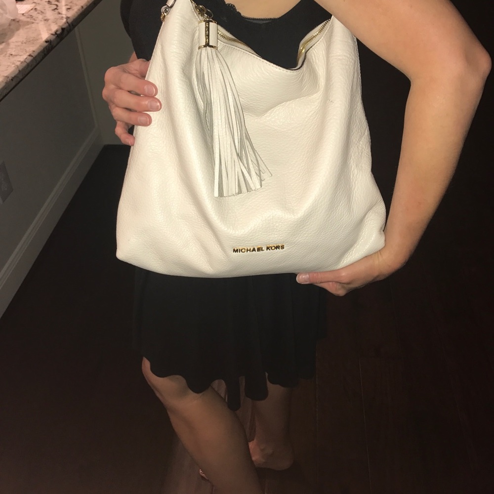 Michael Kord Cream purse