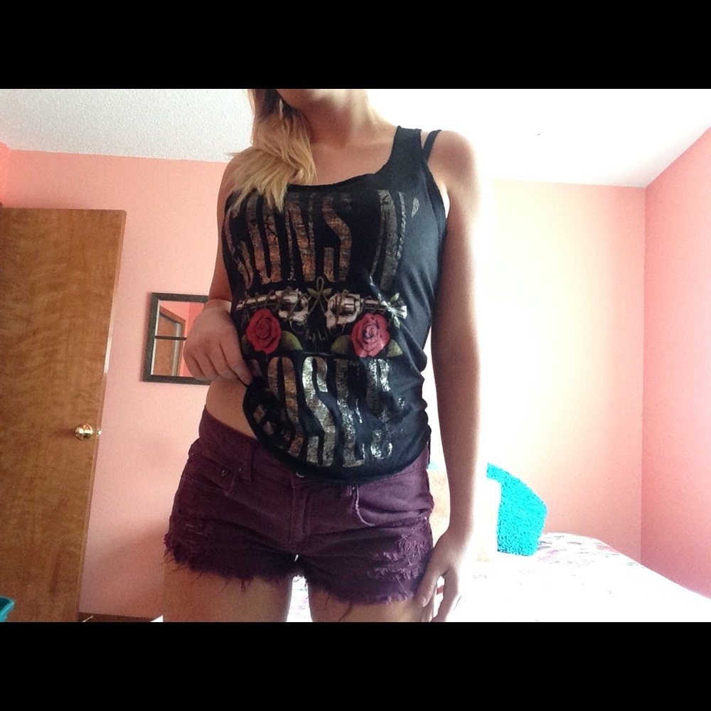 Maroon distressed American Eagle Shorts.