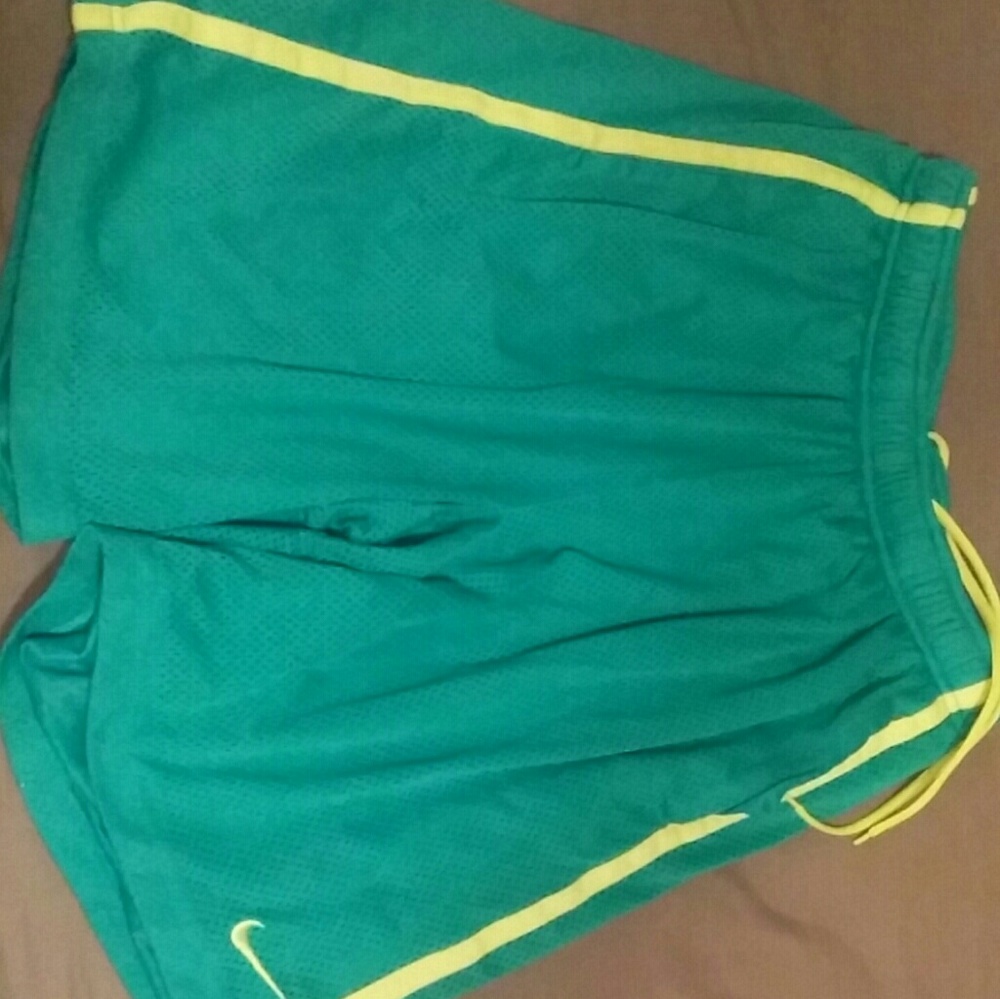 Turqouise nike shorts
