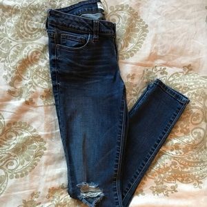 Sneakpeak Distressed Low Rise Skinny Jeans
