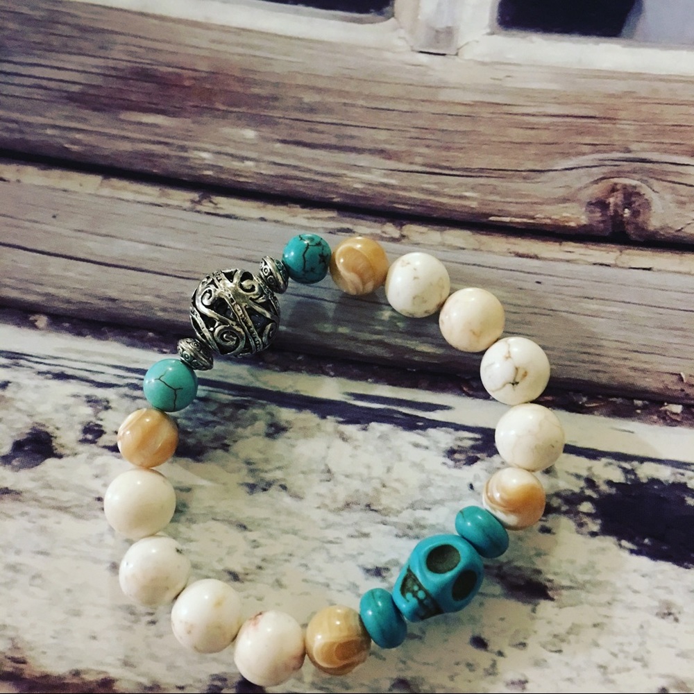 Turquoise colored skull bracelet