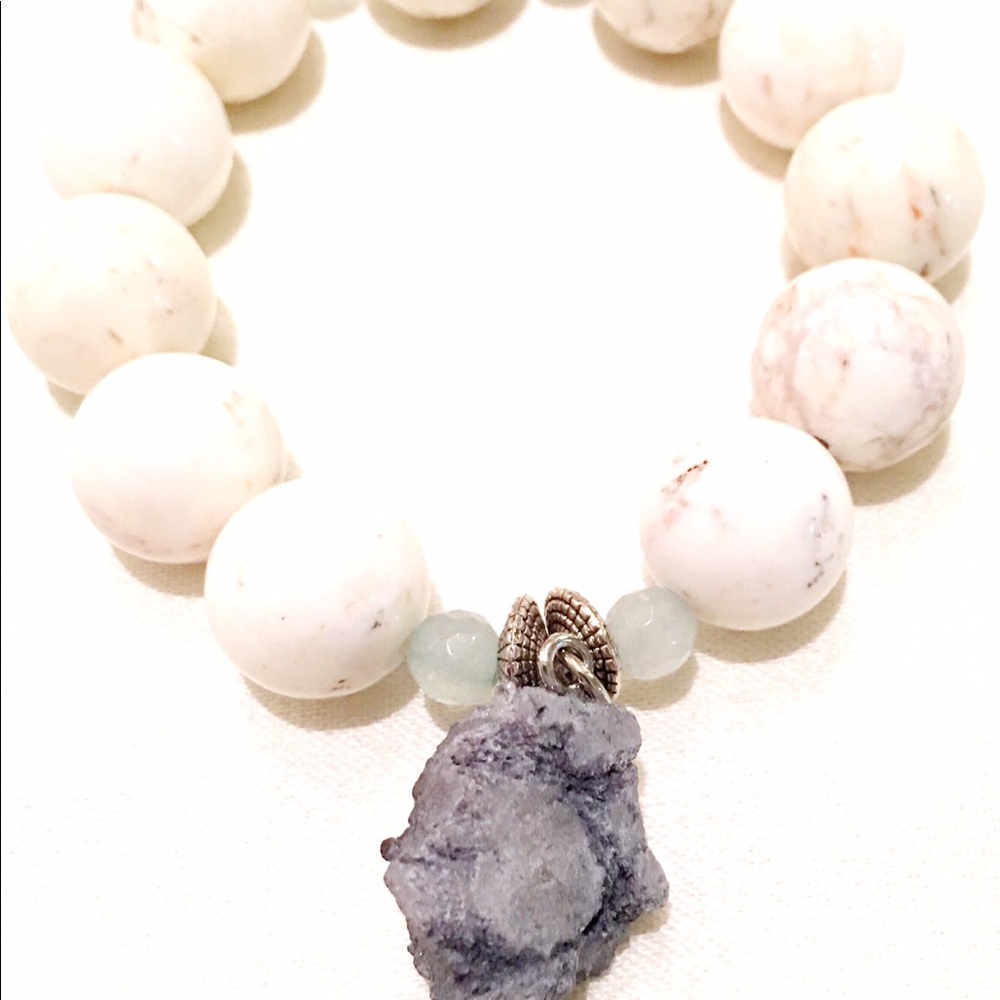 Rock charm bracelet with white beads