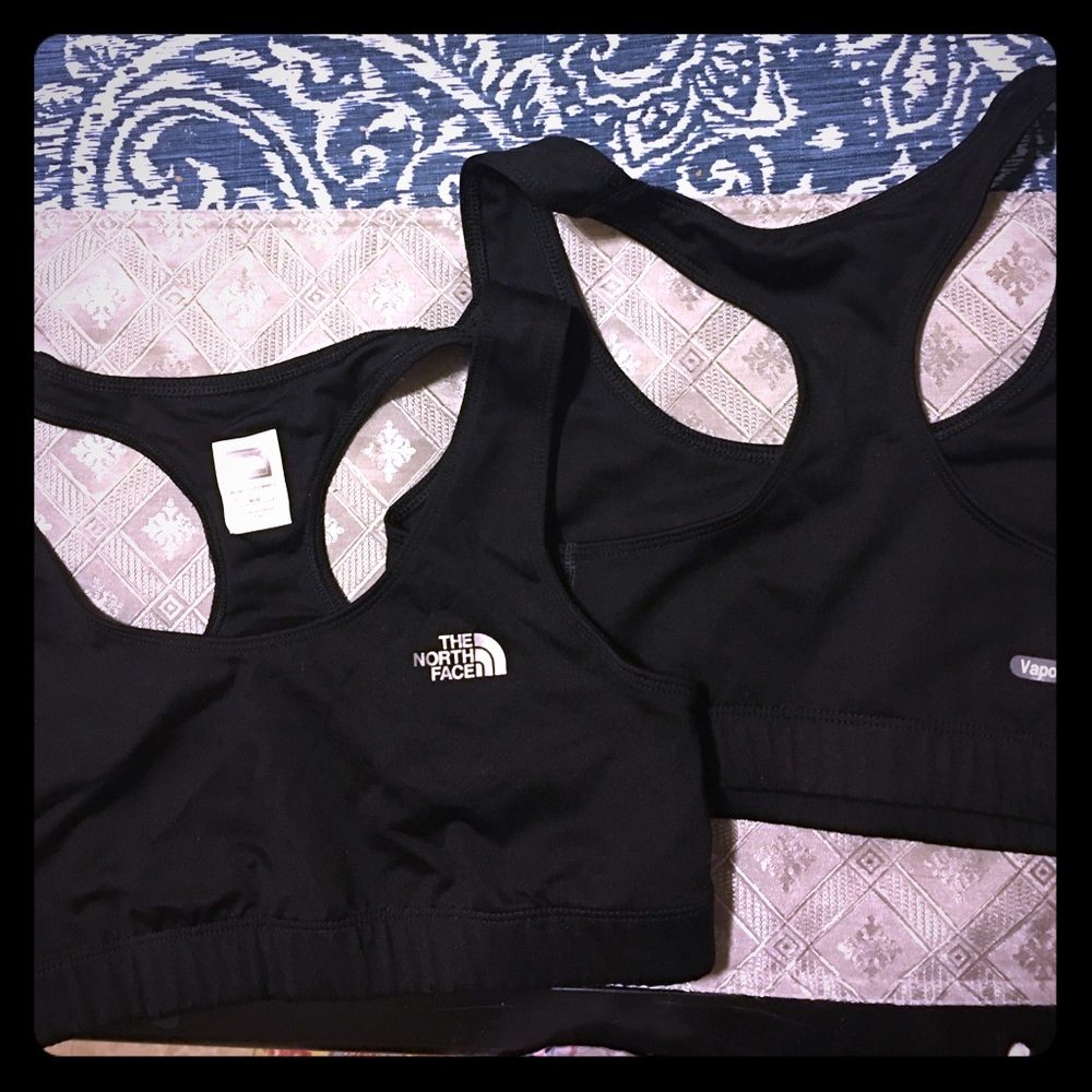 2 black north face sport bras