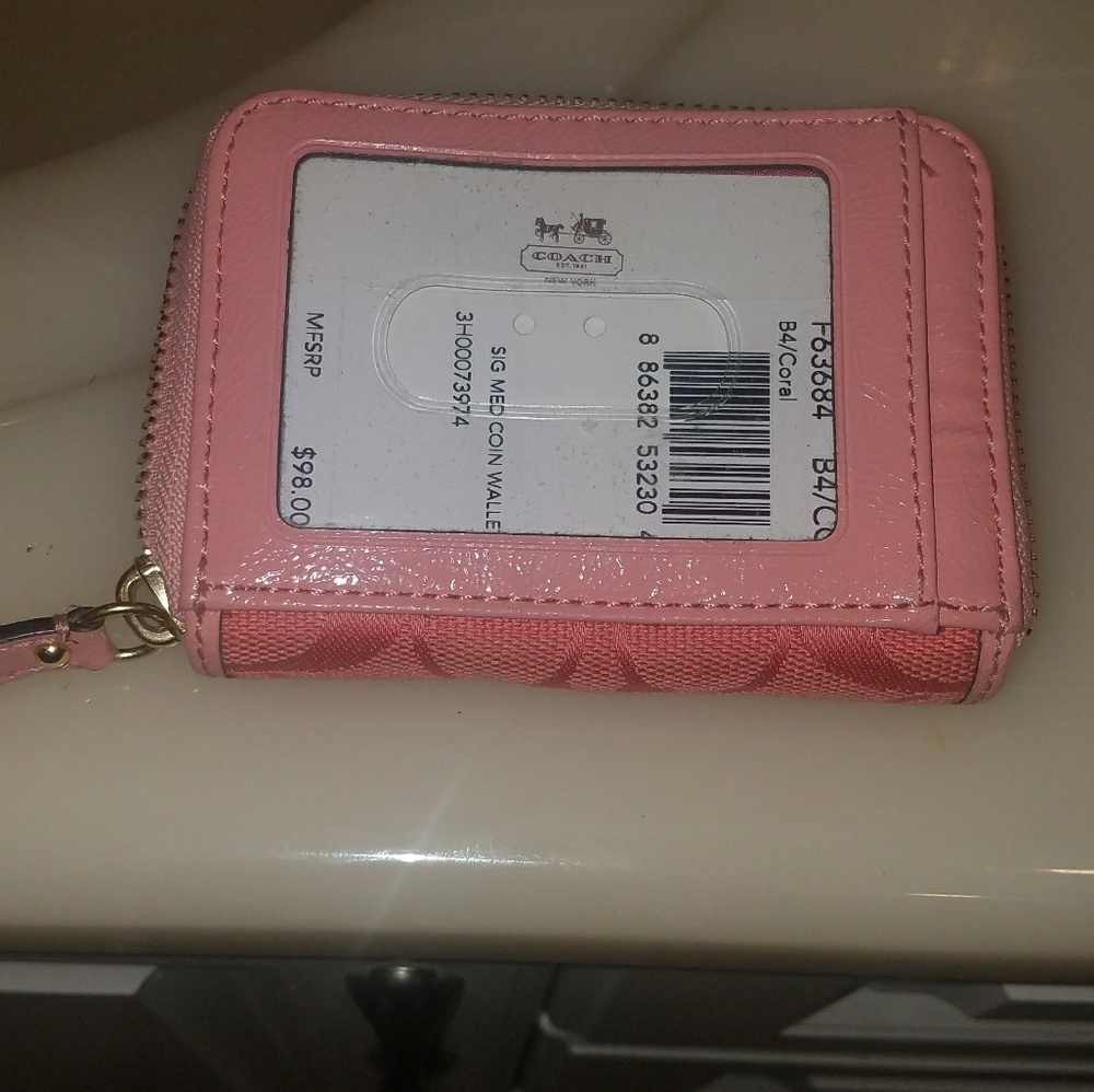 Peach coach mini wallet
