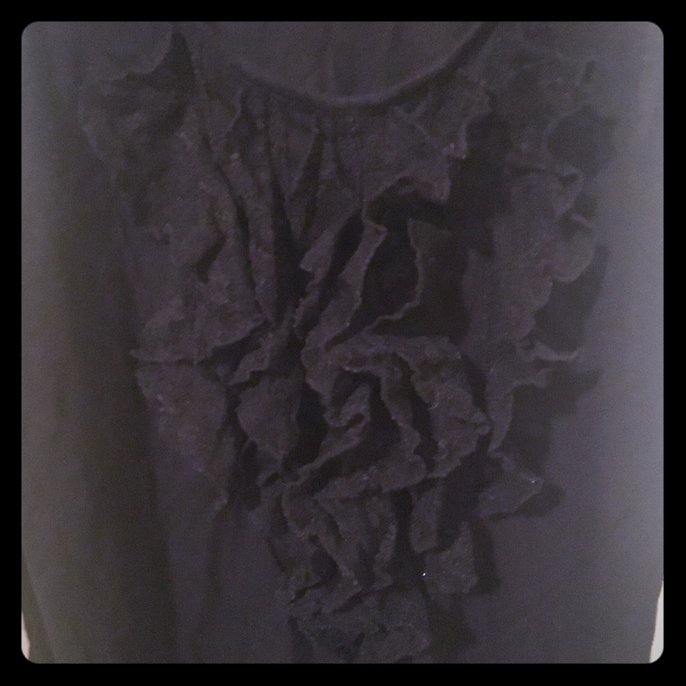 Black tank top with ruffles in the center