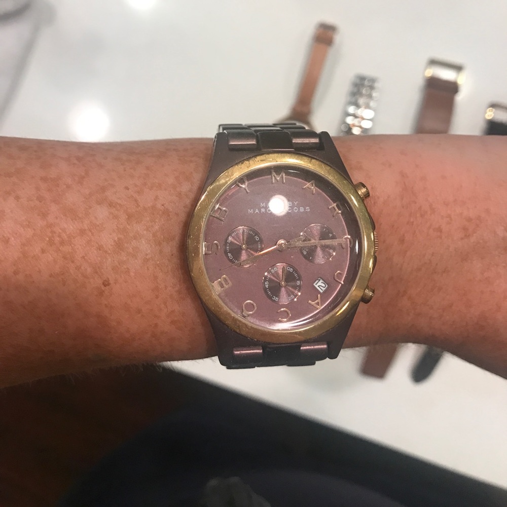 Dark purple and rose gold Marc watch, light metal
