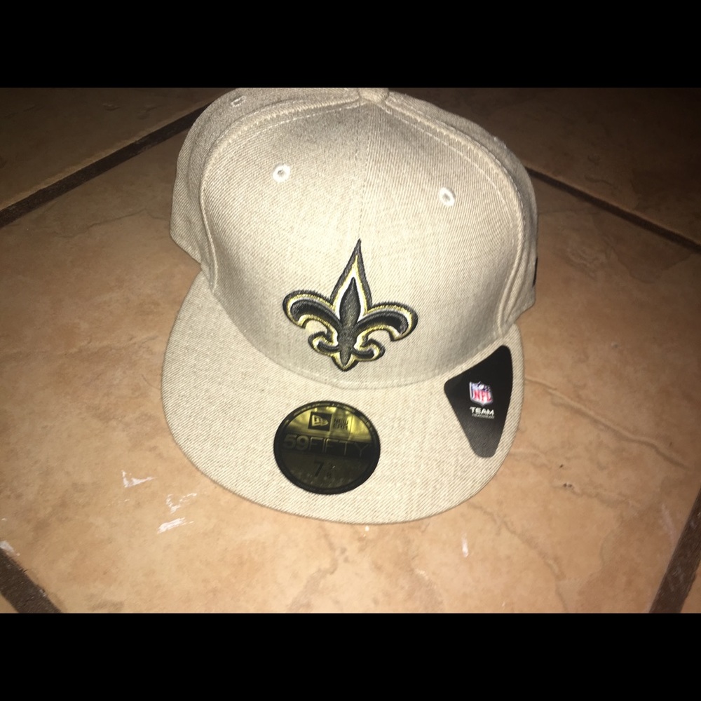 black and gold embroidered logo on the front