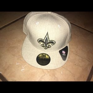 black and gold embroidered logo on the front