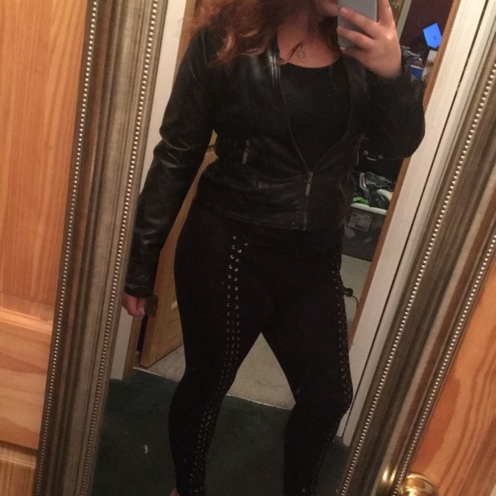 Leather jacket black tank and tied leggings