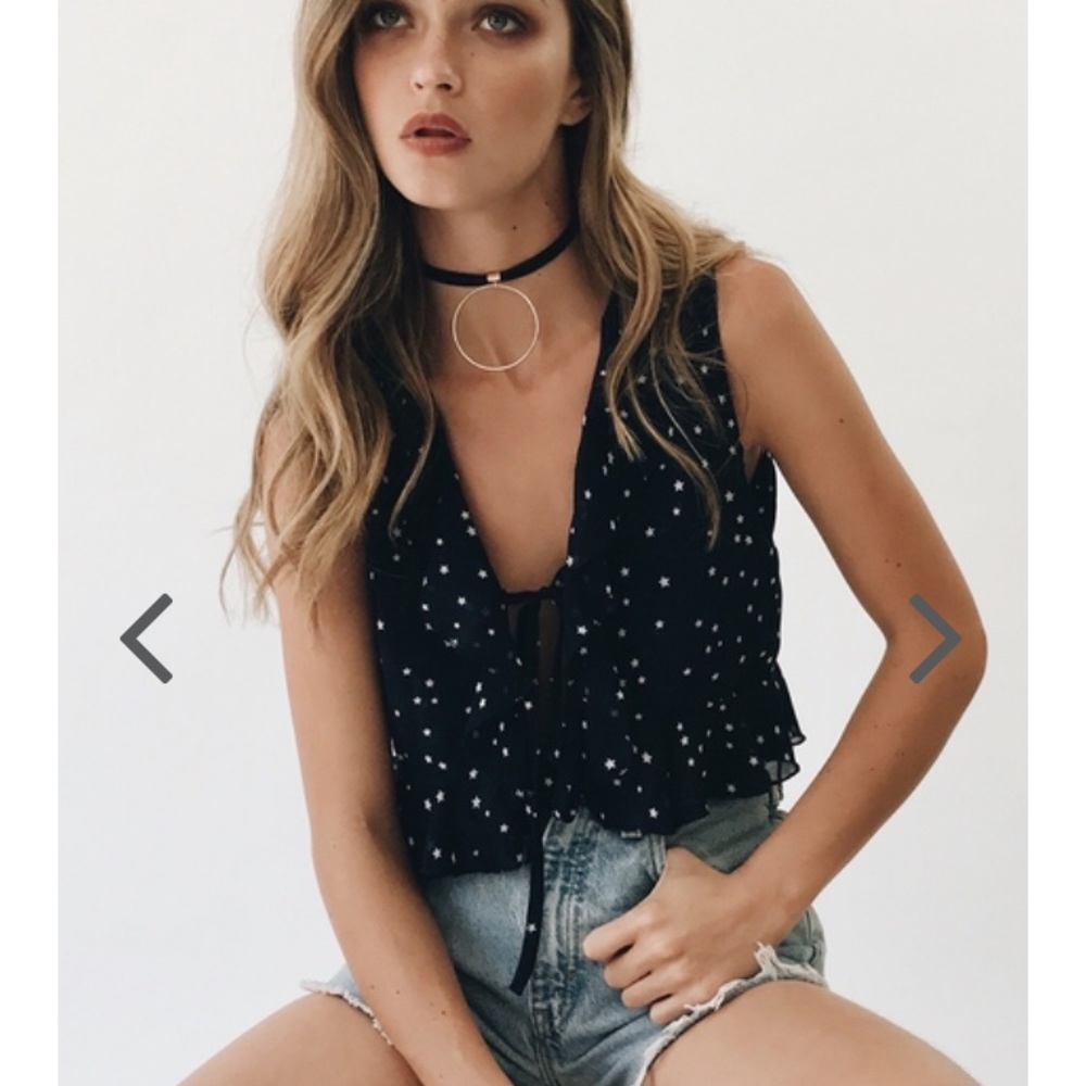 Verge girl downtown lights star top