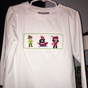 Peter Pan smocked long sleeve. Never worn