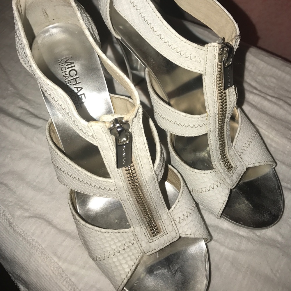 Michaela Kors off white high heel sandals.