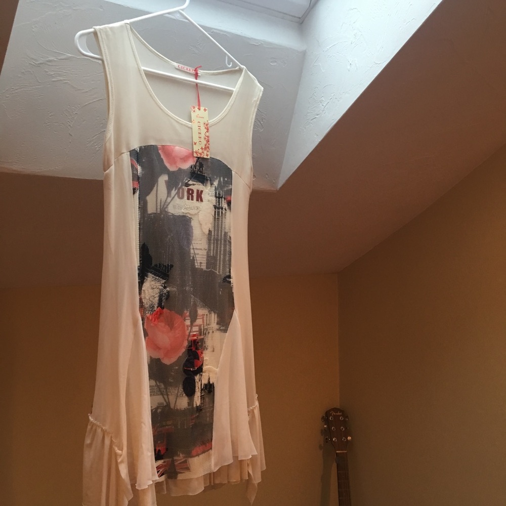 Very stylish dress which I purchased in Paris.
