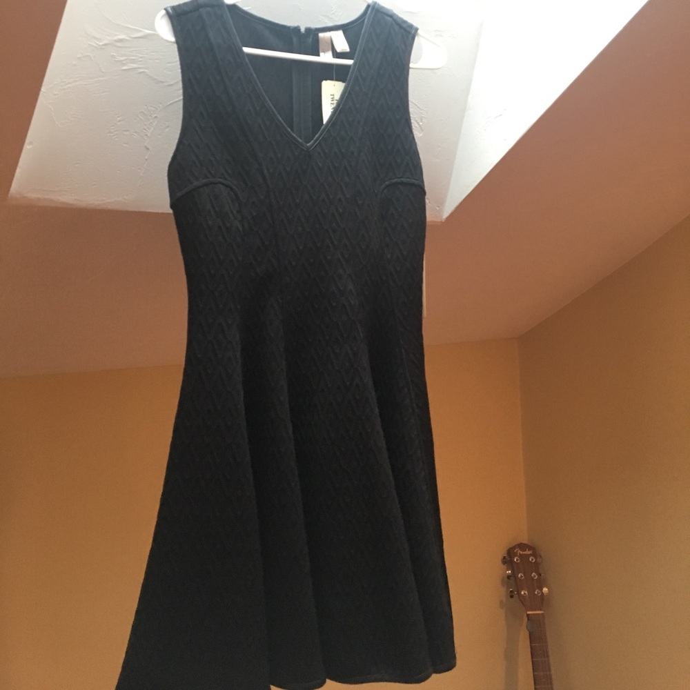 Black dress with leather trim