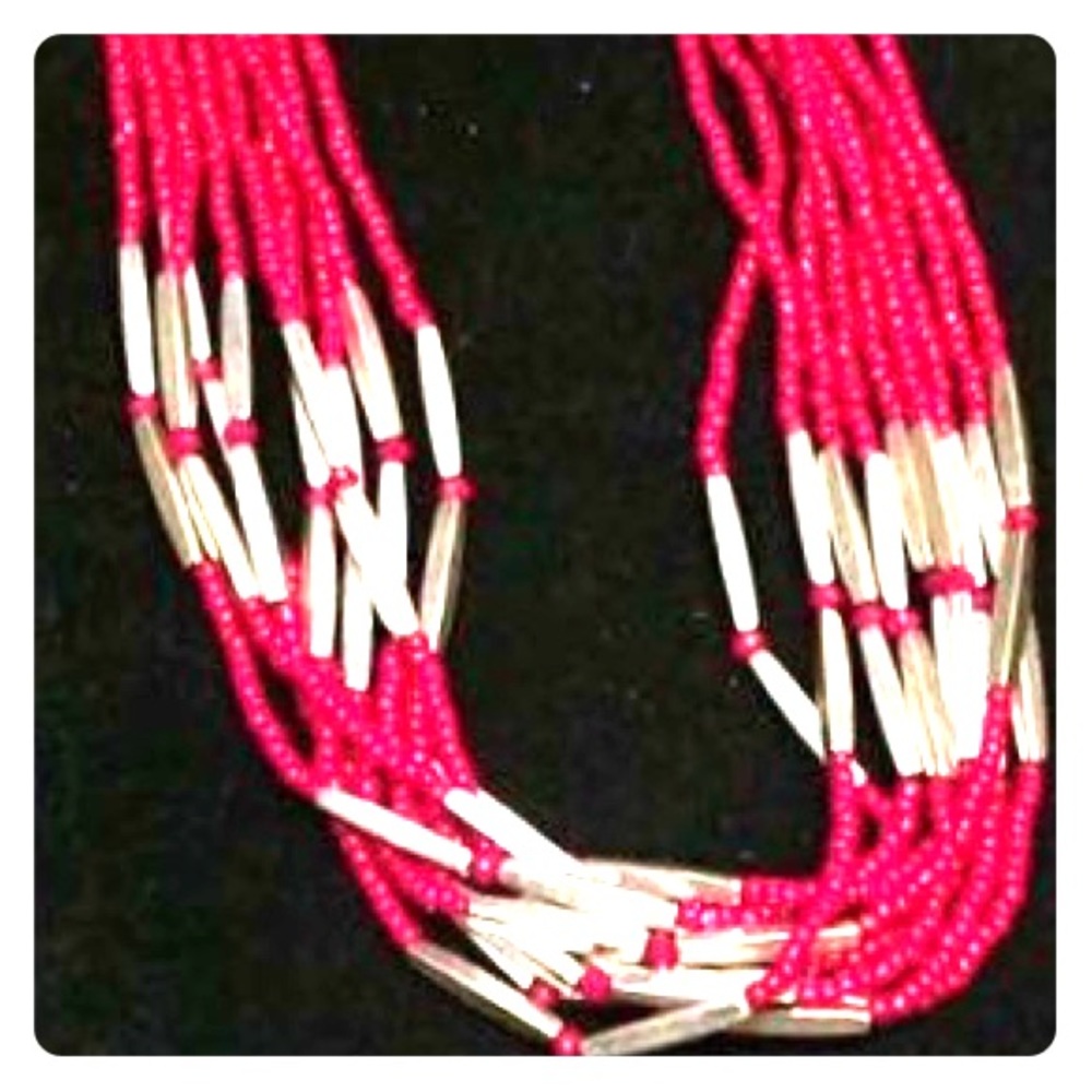 Hot pink choker twist style necklace.