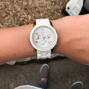 Michael Kors white and gold women's watch.