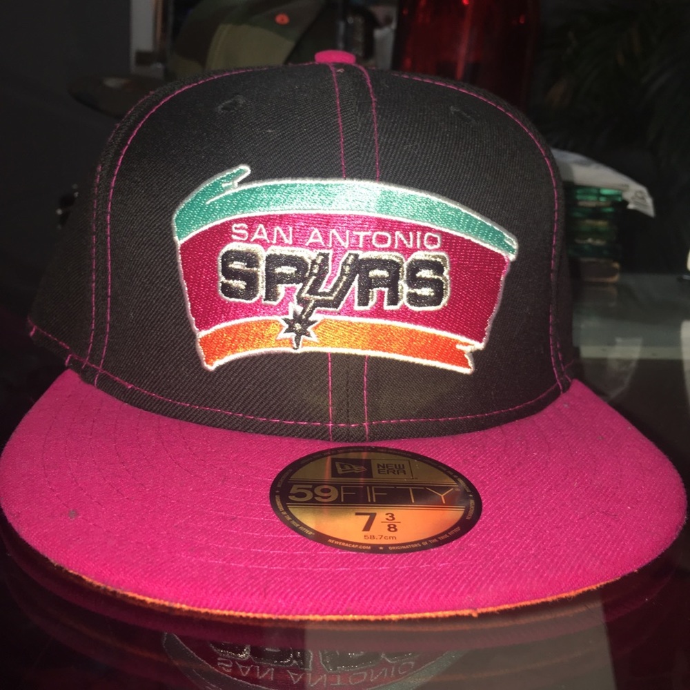 Pink and black spurs hat