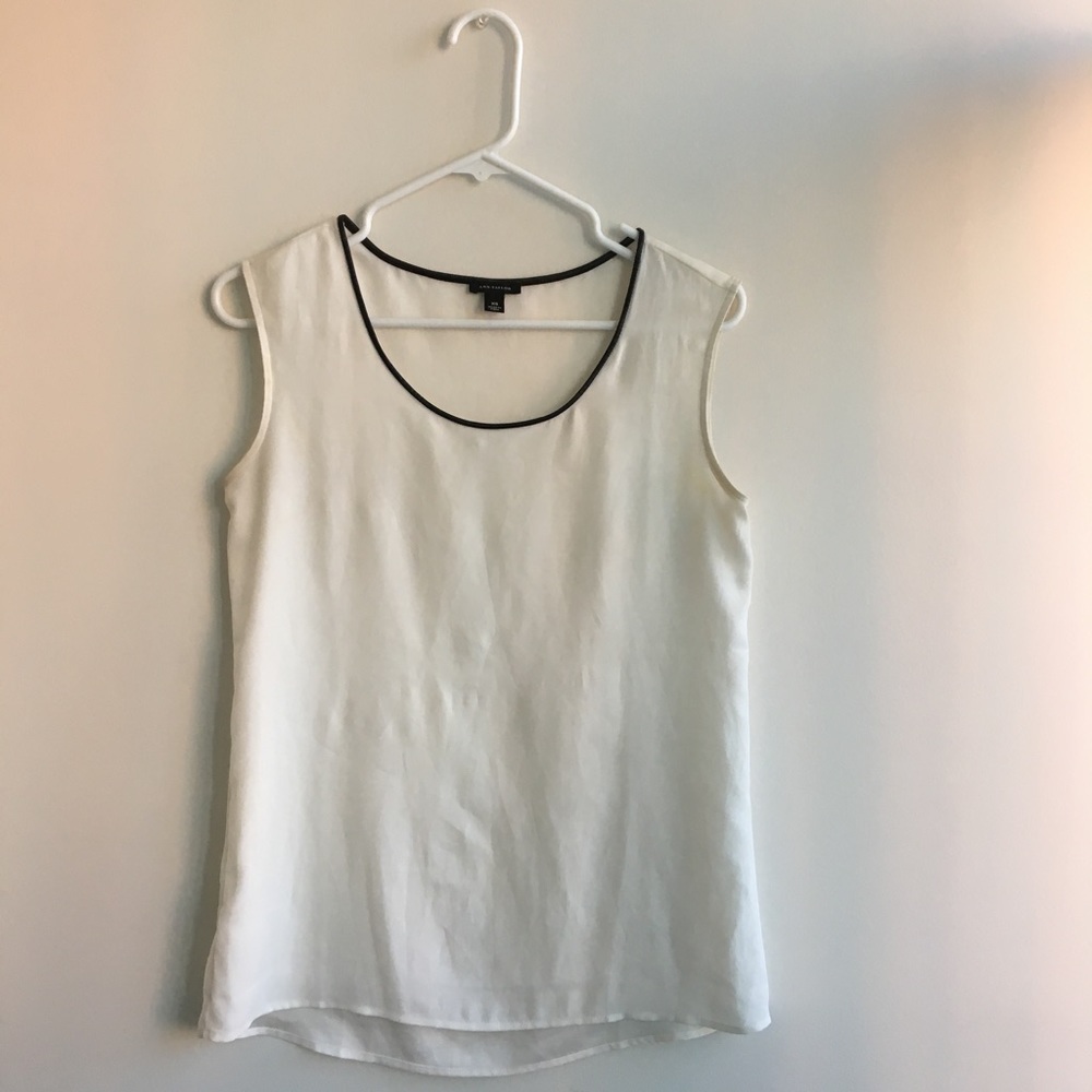 White top with faux leather trim