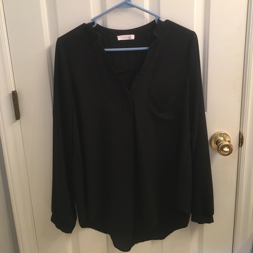 Never worn blouse size M!