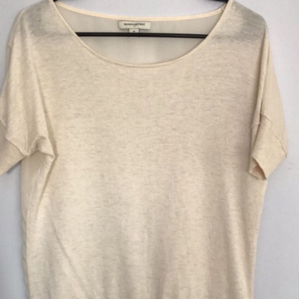 Cream colored Banana Republic sweater blouse.