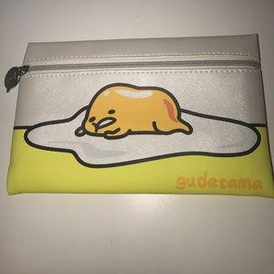 A new ipsy bag,bronzer,blush,lip gloss,eyeliner.