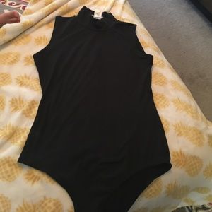 Black high neck sleeveless bodysuit