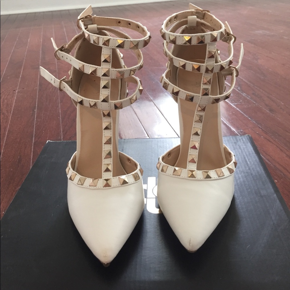 White heels with gold studs