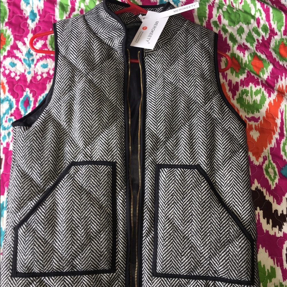 MUST SELL!!!!!  Quilted black and white vest