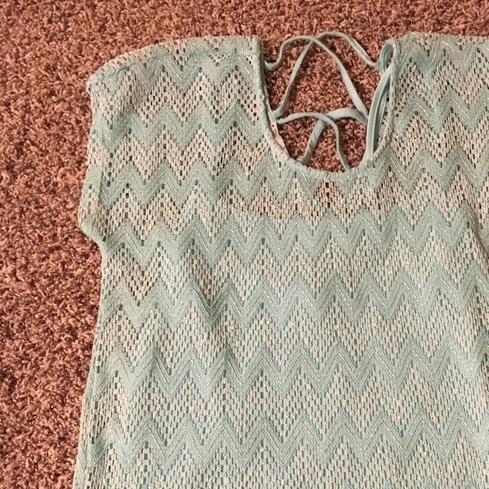 Top with tank attached