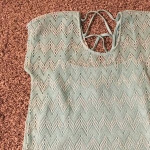 Top with tank attached