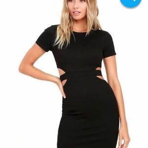 Women's black fitted cotton dress w/side cutout.