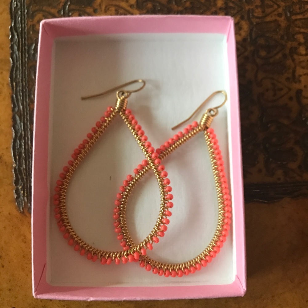 Coral colored dangling earrings