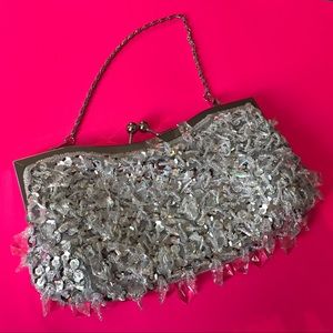 Really cute silver Versona clutch