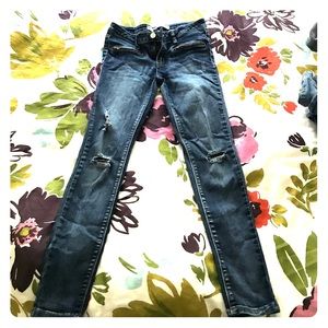 Distressed skinny jeans
