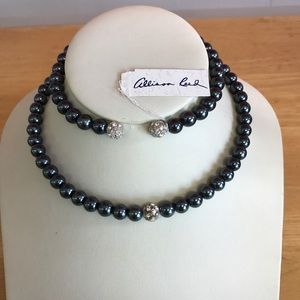 Syn. black pearl choker and matching bracelet .