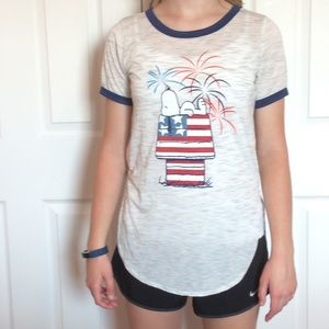 A snoopy red white and blue shirt