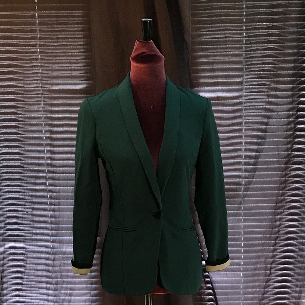 A greenish teal blazer for women