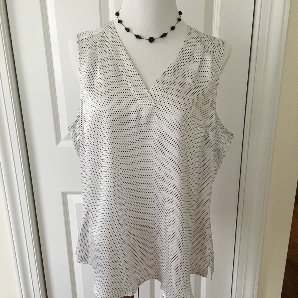 White House Black Market sleeveless dress shirt.