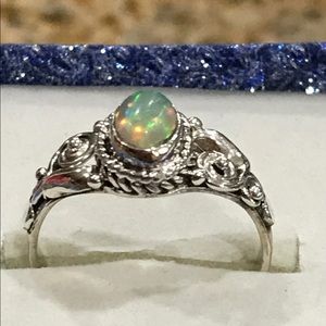 Ethiopian opal scroll silver ring
