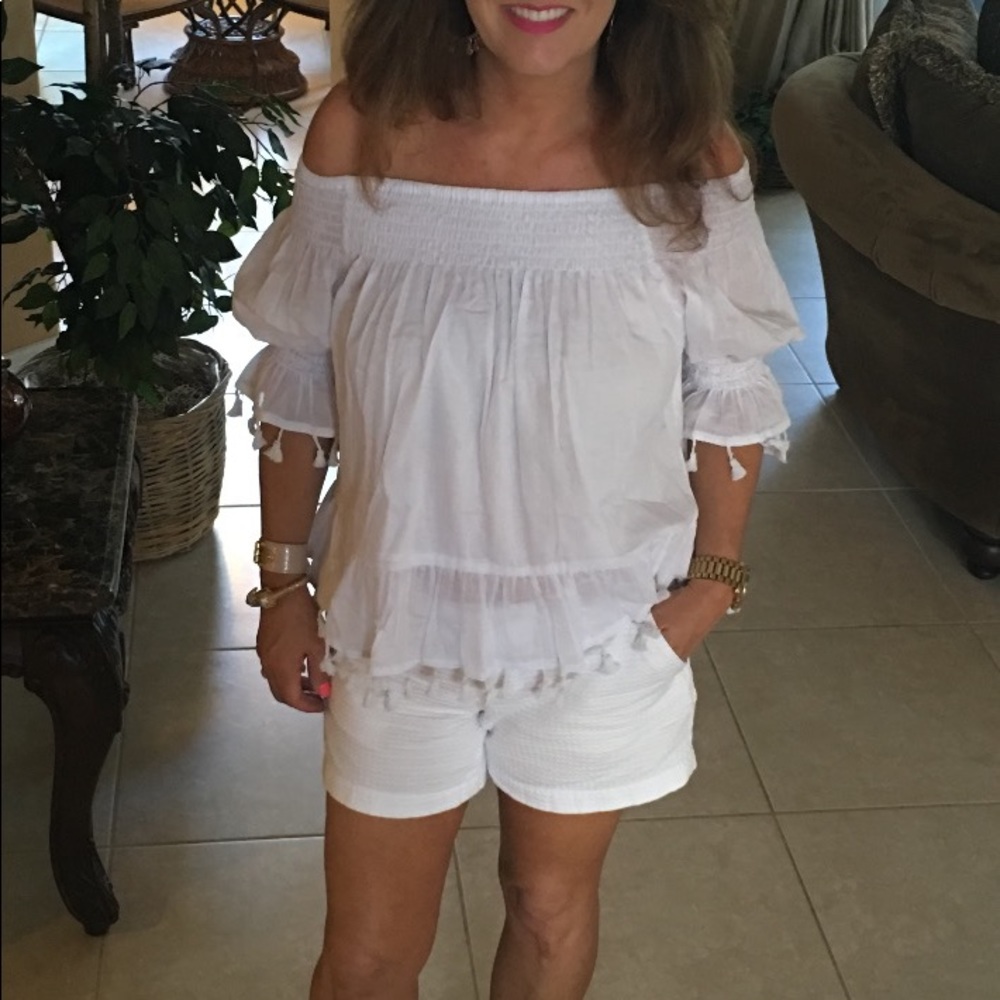 White off the shoulder top with tassels